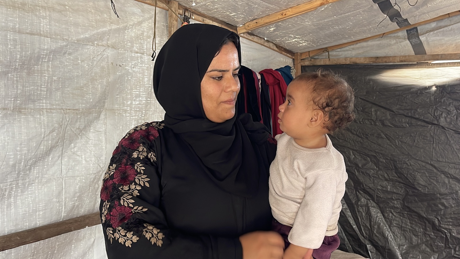 Maryam* lives in Al Zawaida, Gaza, with her husband and two daughters. They need tarpaulins, hygiene materials, water, and winter supplies. (Photo: CESVI/Concern Worldwide)