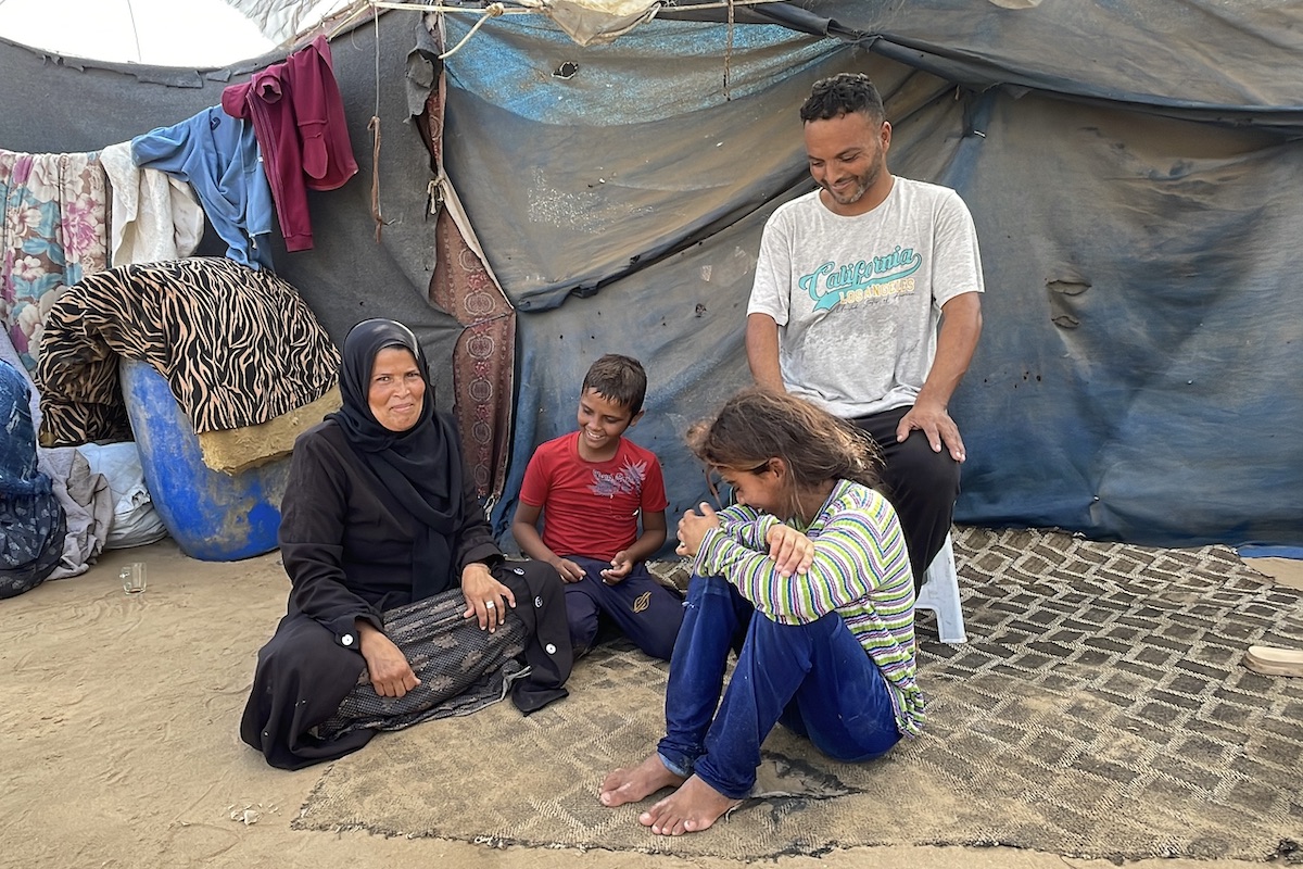 Maryam* lives in Al-Zawaida, Gaza Strip, with her husband and children and is receiving support from Concern and its partner CESVI. The family were displaced from Al Zaytoun. Maryam* says "We faced difficulties obtaining water and the time when water was available was limited." (Photo: Concern Worldwide)
