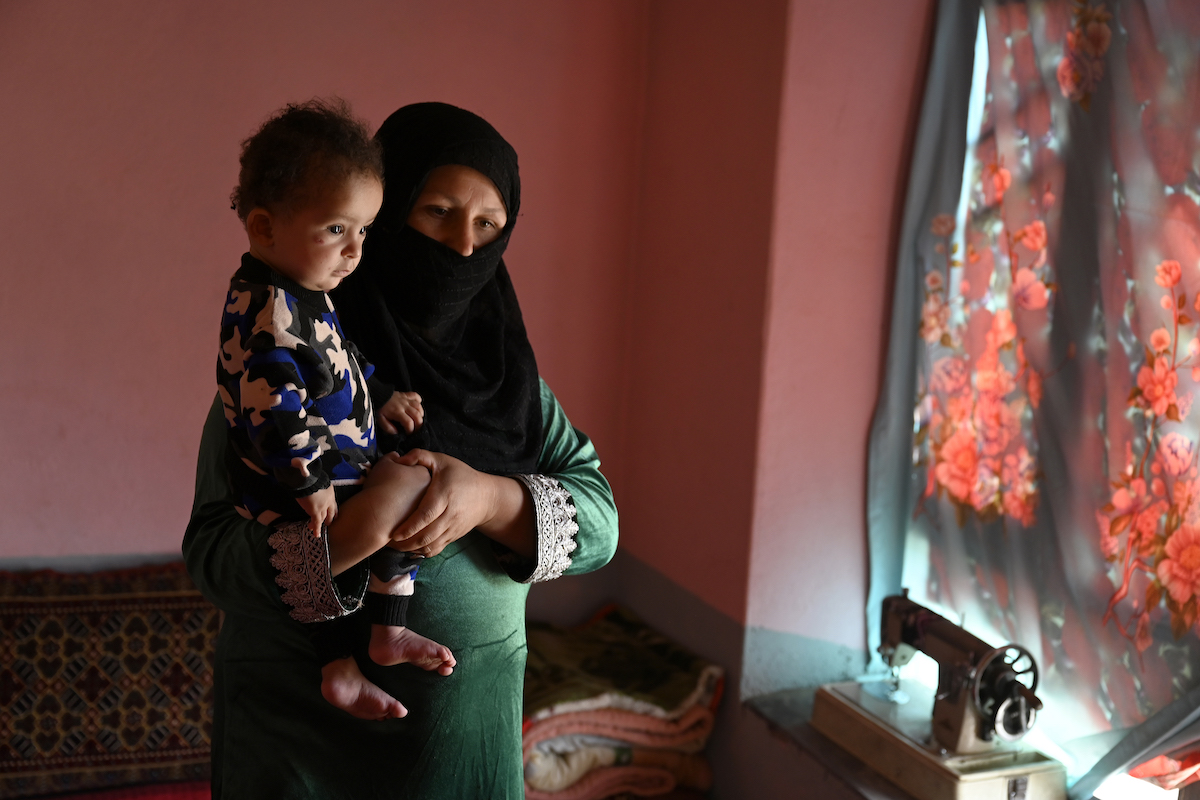 Malalai* holds her son Hafez*. Despite a difficult birth and ongoing complications, he has been recovering through a Concern-supported clinic near the family's home in Noor Aba. (Photo: Nava Jamshidi/Concern Worldwide)