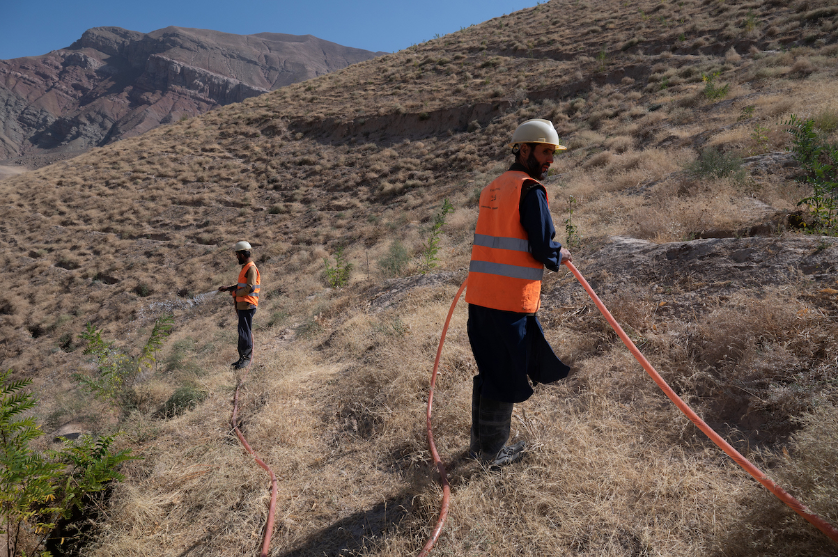 Khajeh Khairab village, Chahab. Watershed community members in flood-prone areas irrigate the surrounding dry areas through a newly-created water supply, which protects villages against potential floods. Photo: Nava Jamshidi/Concern Worldwide