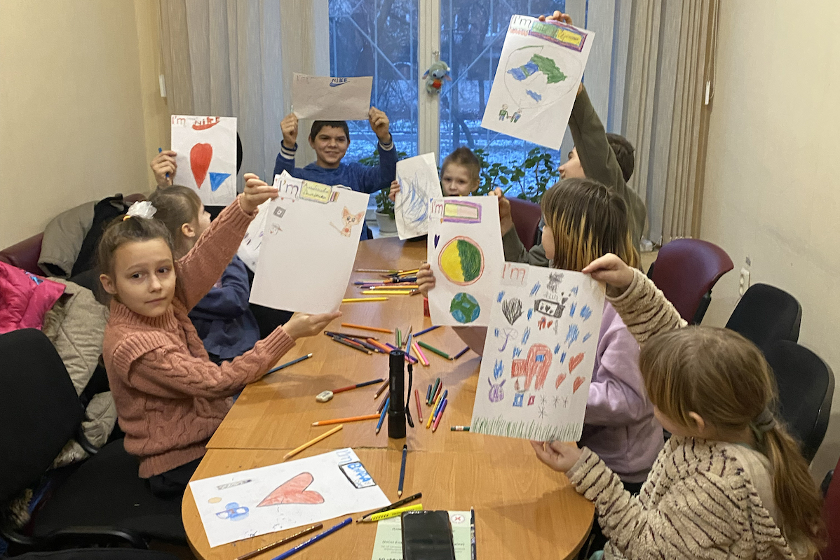 Natalia* (8) and Sofia* (7) attend a children's play therapy session in Kharkiv. (Photo: Jon Hozier-Byrne/Concern Worldwide)
