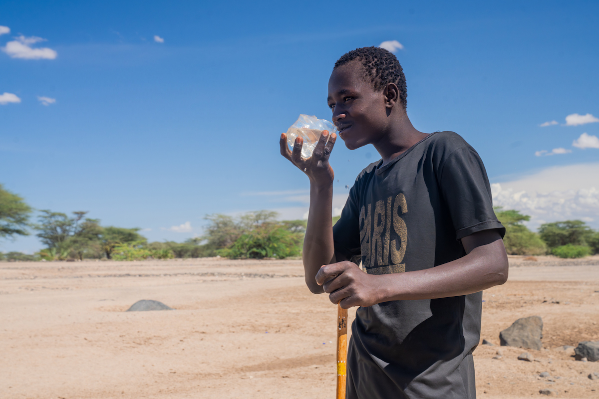 Peter Nasinyono drinking water in Lodwar town on the outskirts of Nang’ole Kuruk village, in Kenya's Turkana district. The area has faced decades of droughts. (Photo: Eugene Ikua/Concern Worldwide)