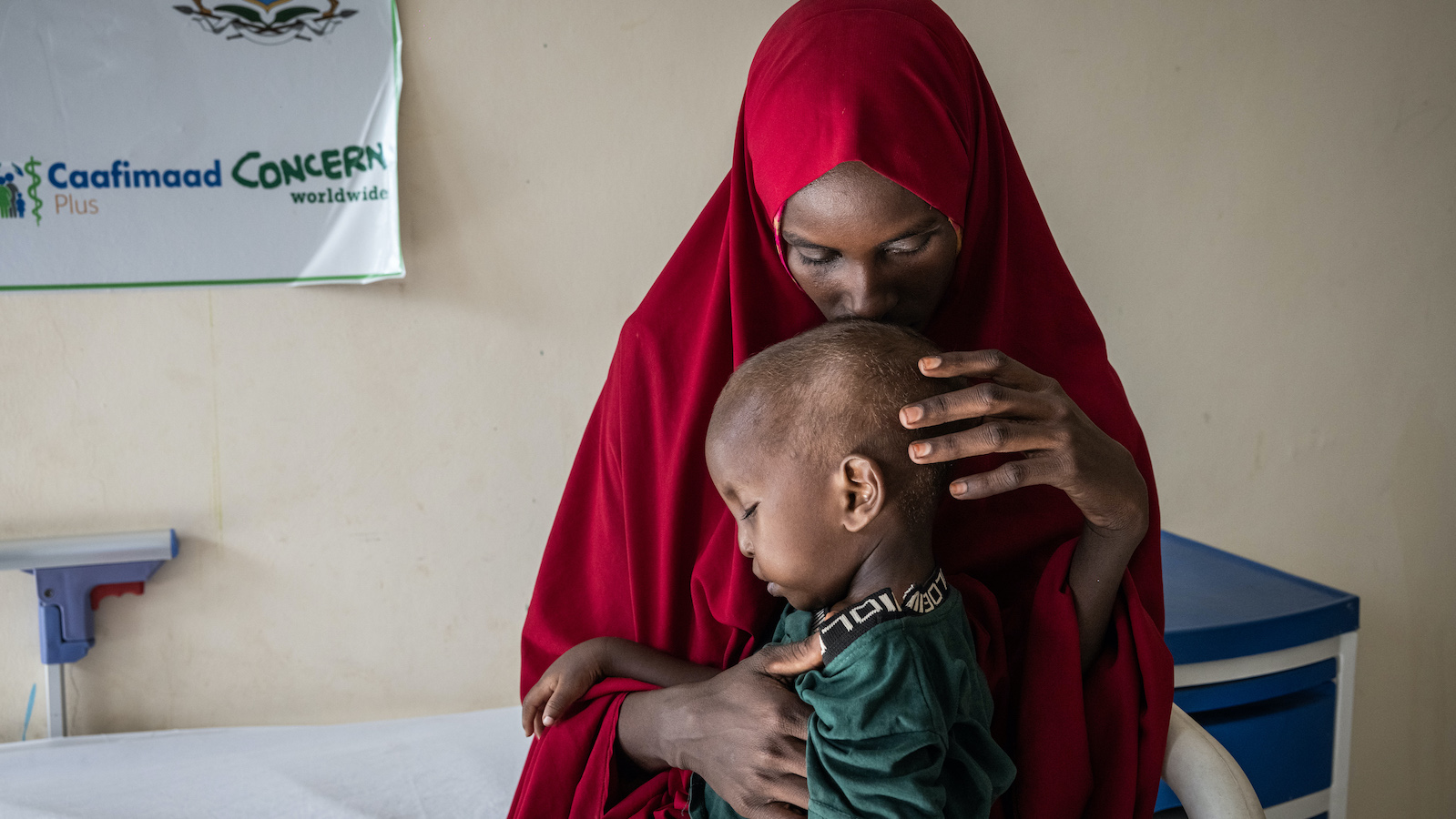 Nafiso* (20) holds her son Razaq* (2) in the Concern-supported Pediatric Stabilization Center in Banadir Hospital, Mogadishu. (Photo: Ed Ram/Concern Worldwide)