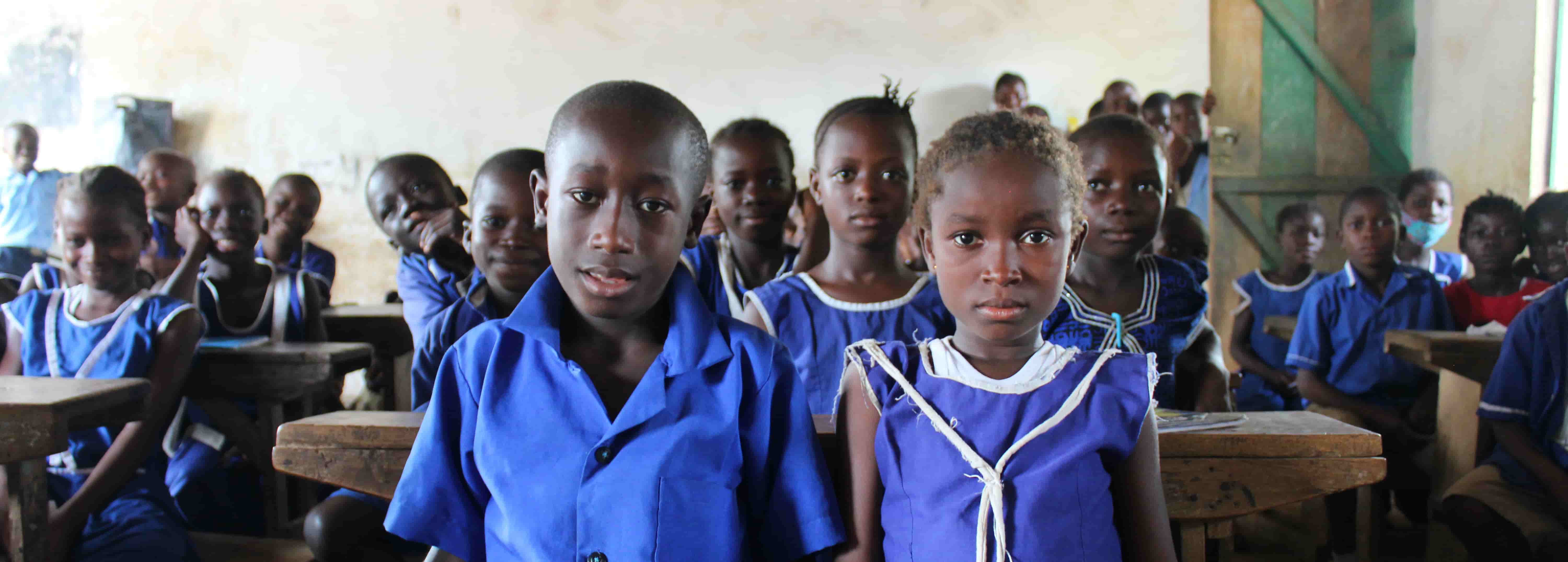 Children standing in classroom