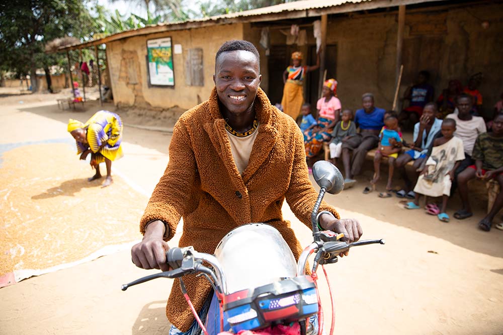 Man on a motorbike in Sierra Leone