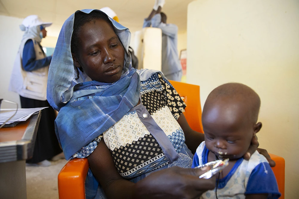 A mother and child a nutrition clinic in a Concern-supported health center in Central Darfur