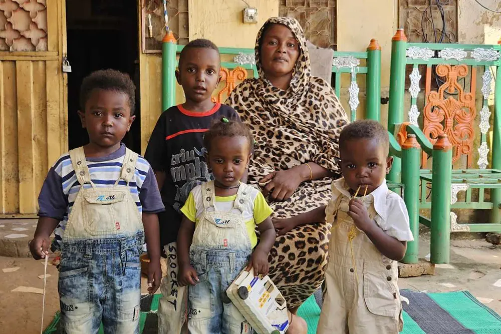 A Sudanese woman and her children.