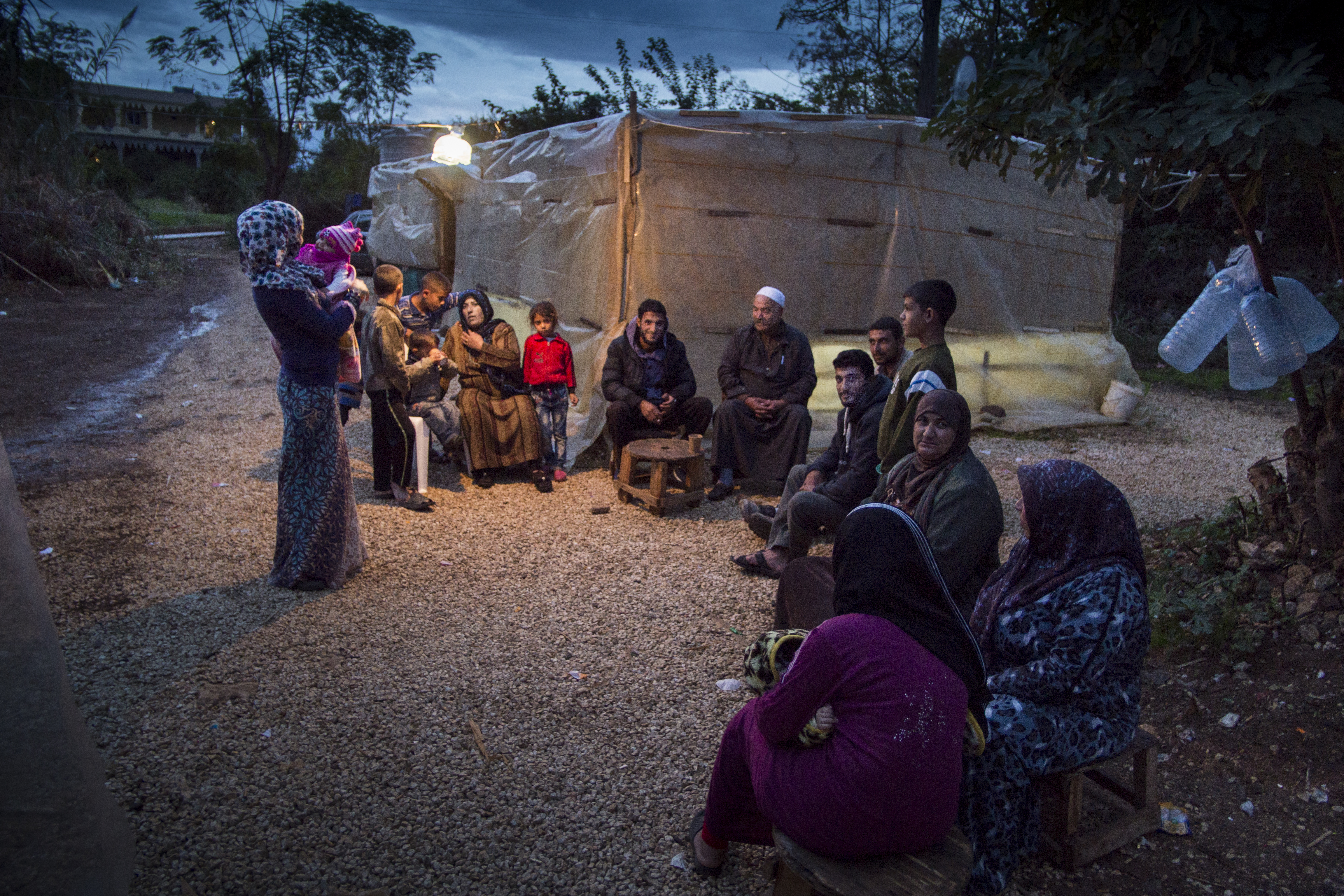 Syrian refugee camp at night