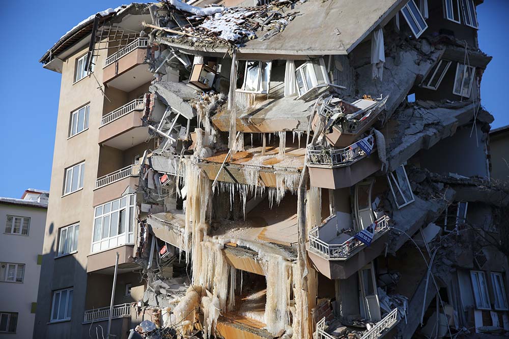 Ice forms on a partially collapsed building in Turkey after the 2023 earthquake