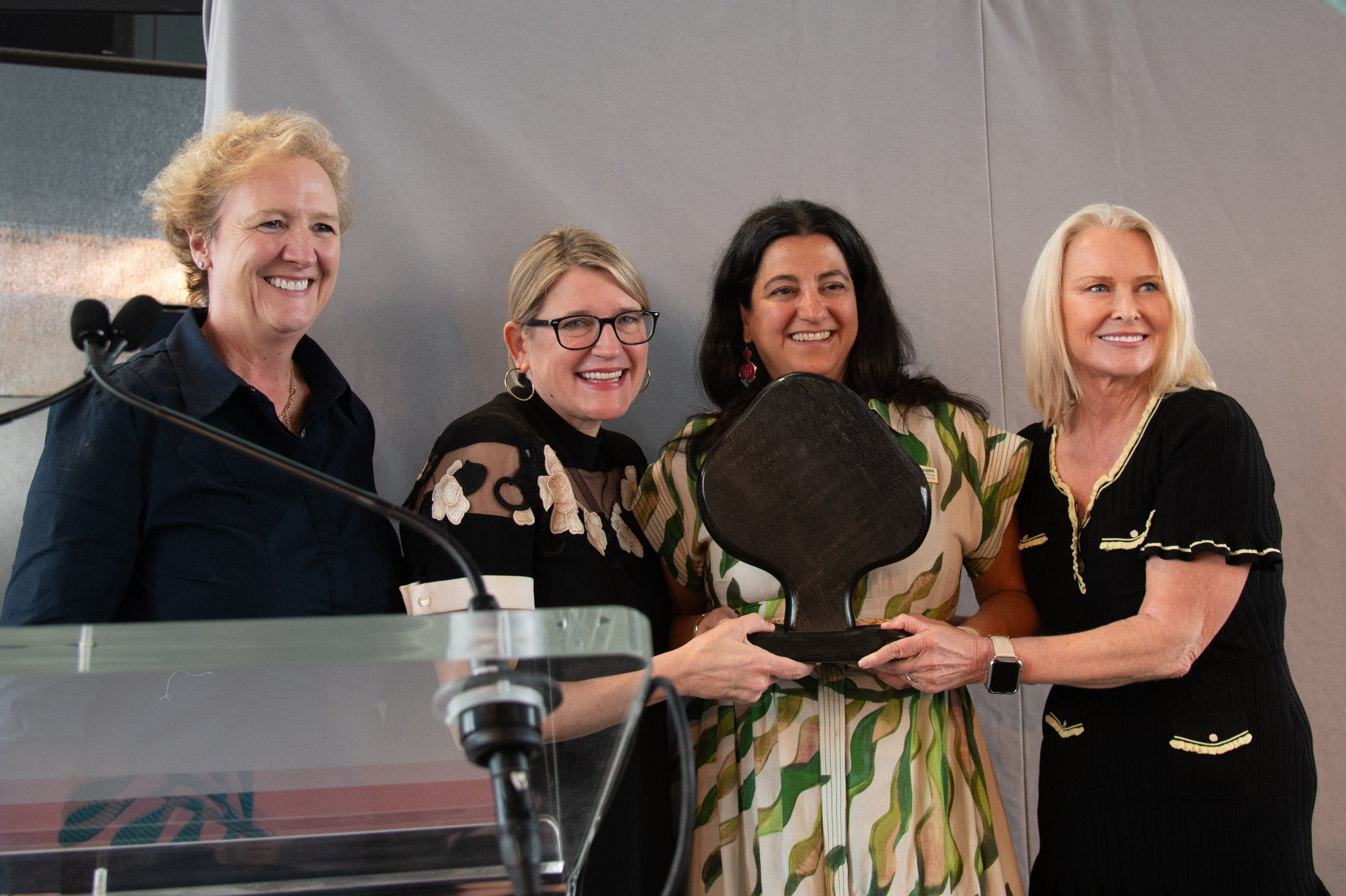 women accepting awards