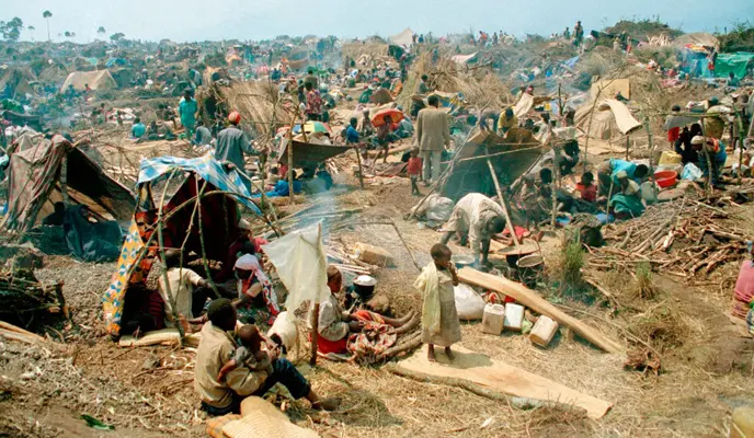 Makeshift shelters in a crowded, rocky area on the outskirts of Goma, Zaire. Concern Worldwide provided emergency relief services here from 1994 for Rwandan refugees.