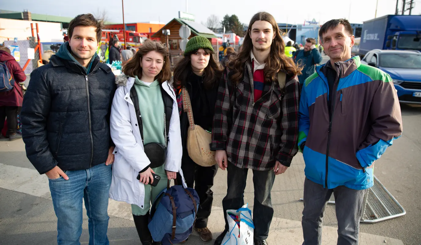 Jan Krejcir, on the right, drove 800kms from the Czech Republic to collect his Ukrainian friend's kids at the Vysne Nemecke border crossing in Slovakia.