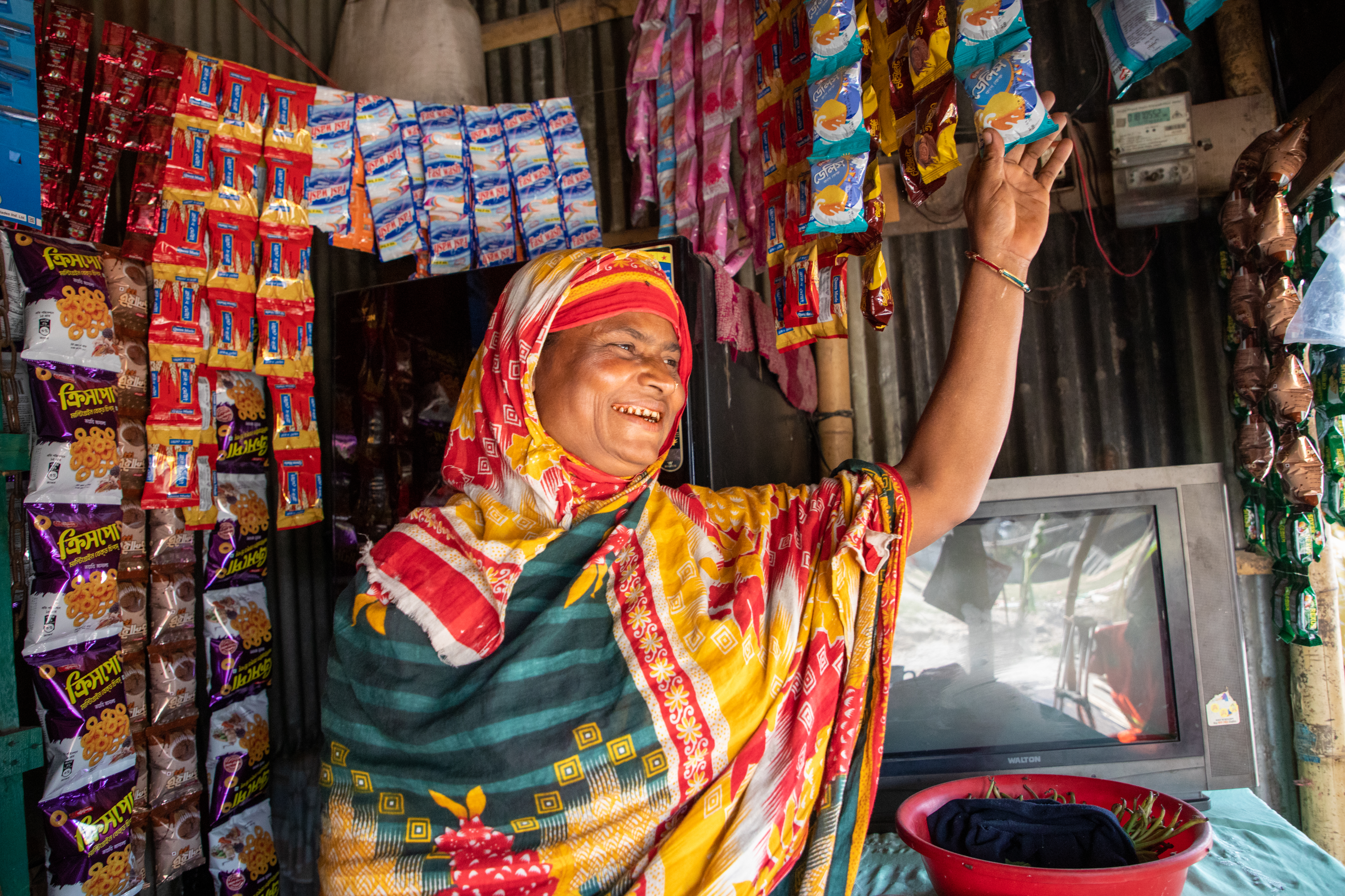 Woman standing in shop in Bangladesh