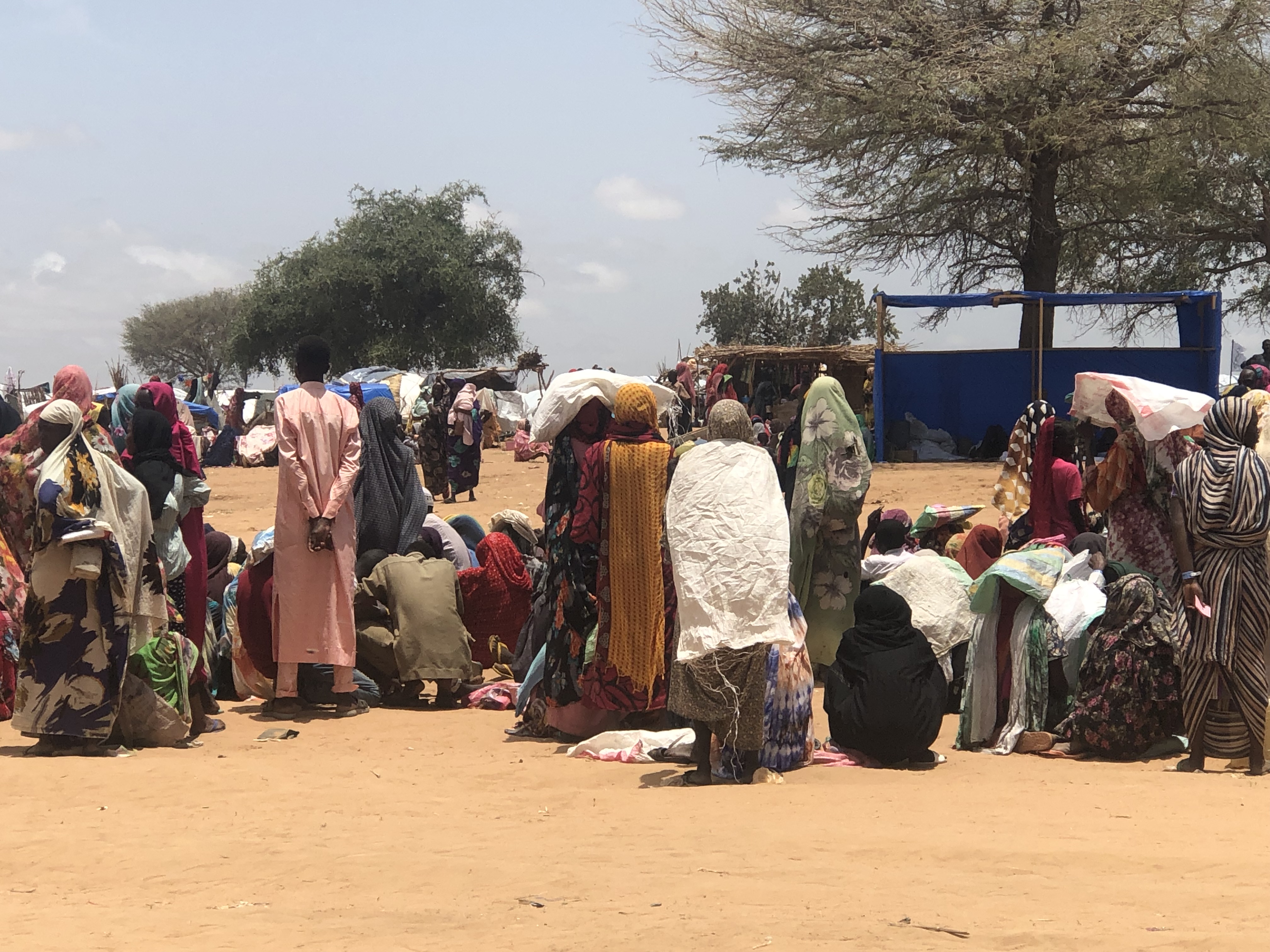 Refugees waiting at food distribution site in Chad.