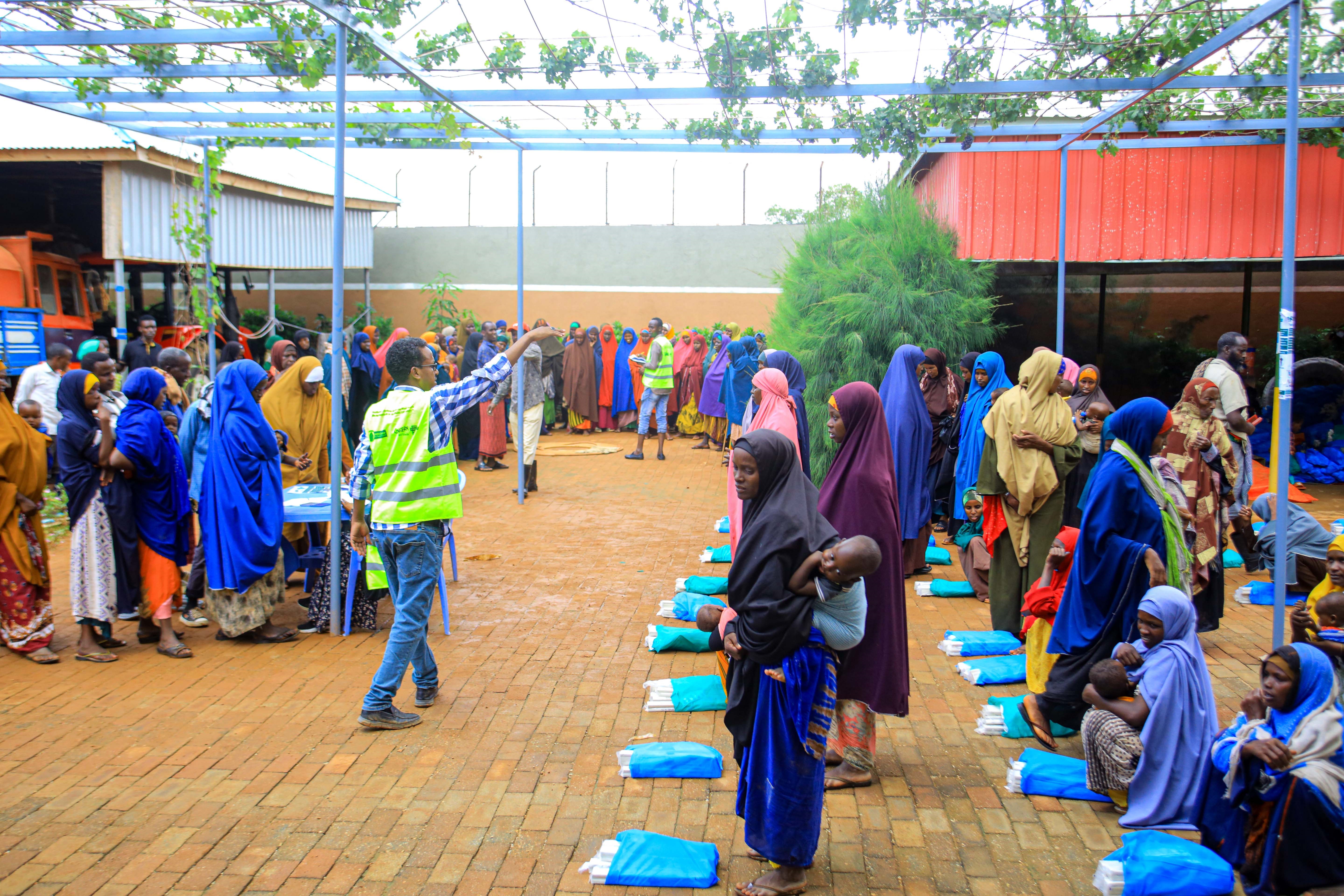 Concern team distributing hygiene kits and non-food items to participating households in Somalia